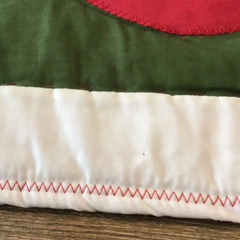 Handmade Christmas-themed applique quilt